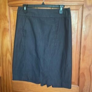 Just above the knee denim like skirt perfect for the office!